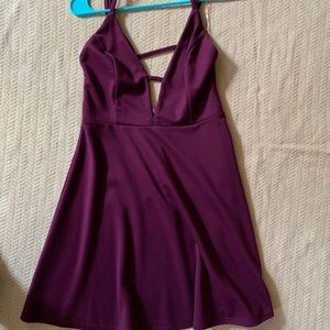 formal dress , strappy and low cut.